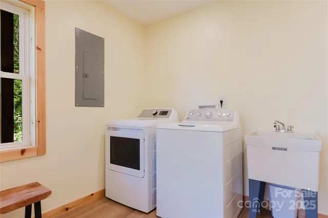 a utility room with dryer and washer