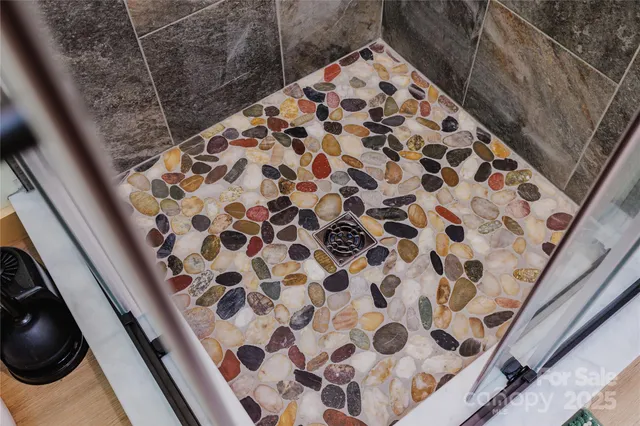 a utility room with sink dryer and washer