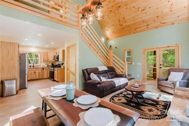 a living room with furniture and a table