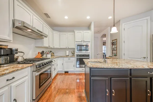 a workspace with furniture and window