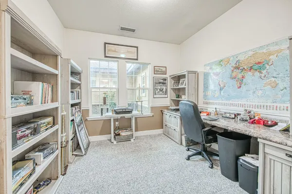 an empty room with a bathroom