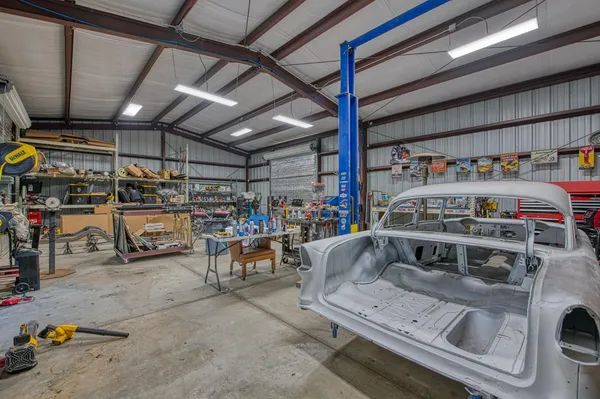 a front view of a house with swimming pool