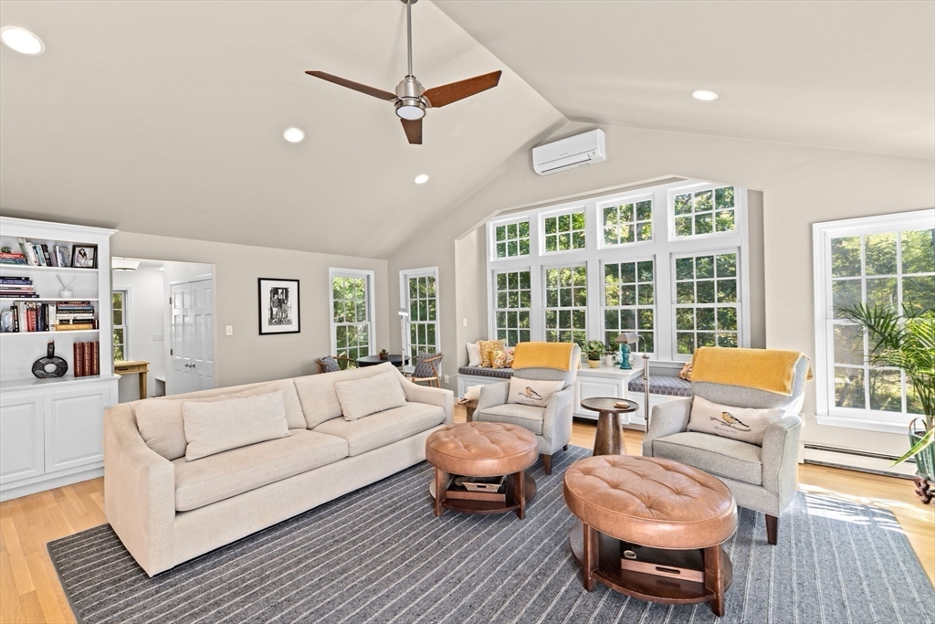 23 Mast Hill Road Hingham, MA 02043 - Photo 11 of 42 a living room with furniture and a large window