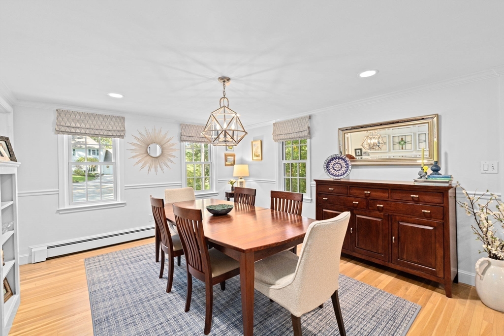 23 Mast Hill Road Hingham, MA 02043 - Photo 17 of 42 a view of a dining room with furniture window and wooden floor