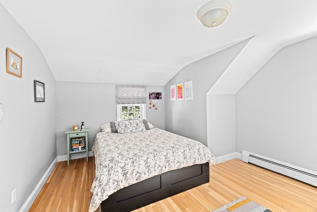 23 Mast Hill Road Hingham, MA 02043 - Photo 28 of 42 a bedroom with a bed and a dresser