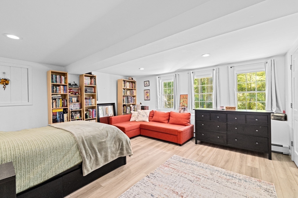 23 Mast Hill Road Hingham, MA 02043 - Photo 32 of 42 a bedroom with a large bed and a window