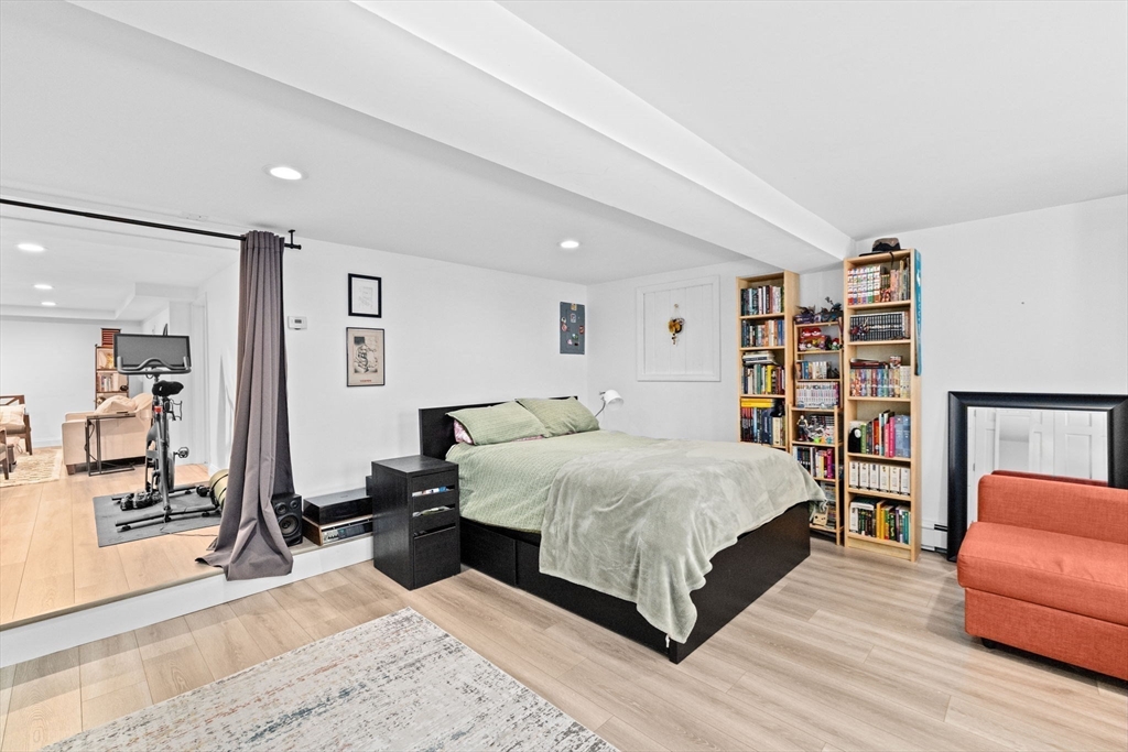 23 Mast Hill Road Hingham, MA 02043 - Photo 33 of 42 a bed room with a bed and a couch