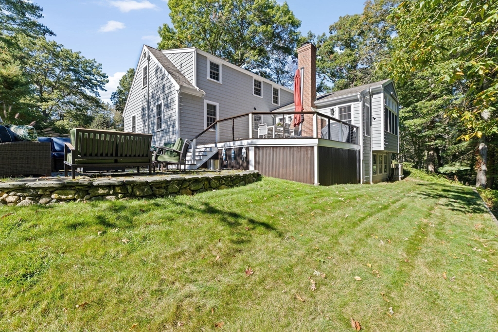 23 Mast Hill Road Hingham, MA 02043 - Photo 38 of 42 a view of a house with backyard and sitting area