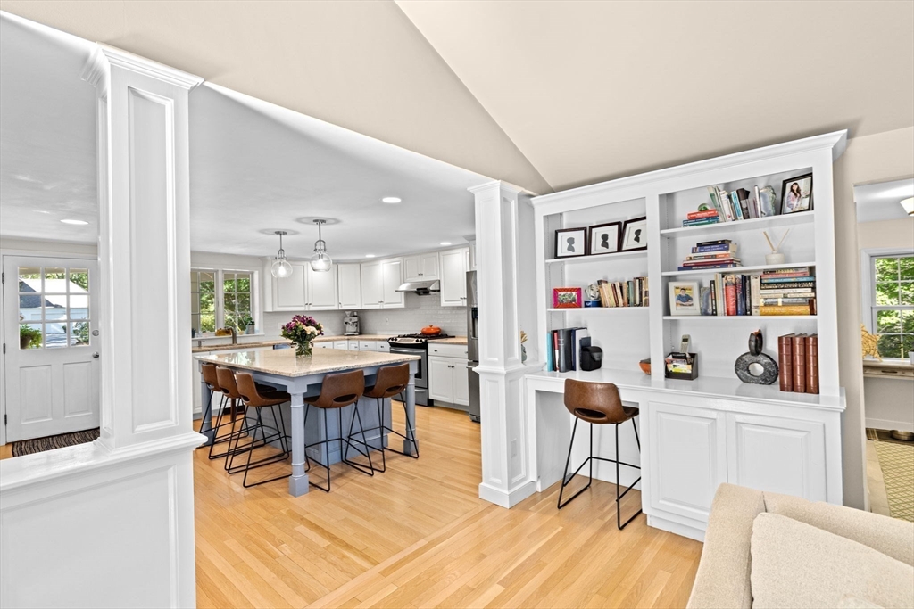 23 Mast Hill Road Hingham, MA 02043 - Photo 7 of 42 a workspace with furniture and a book shelf