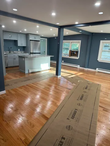 a view of a kitchen with a sink