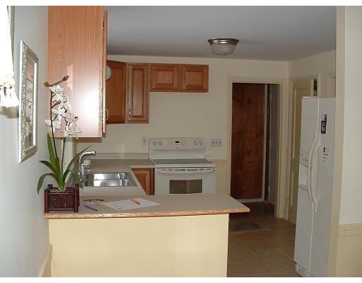 69 Park Avenue Worcester, MA 01605 - Photo 3 of 7 a kitchen with stainless steel appliances granite countertop a sink and a stove