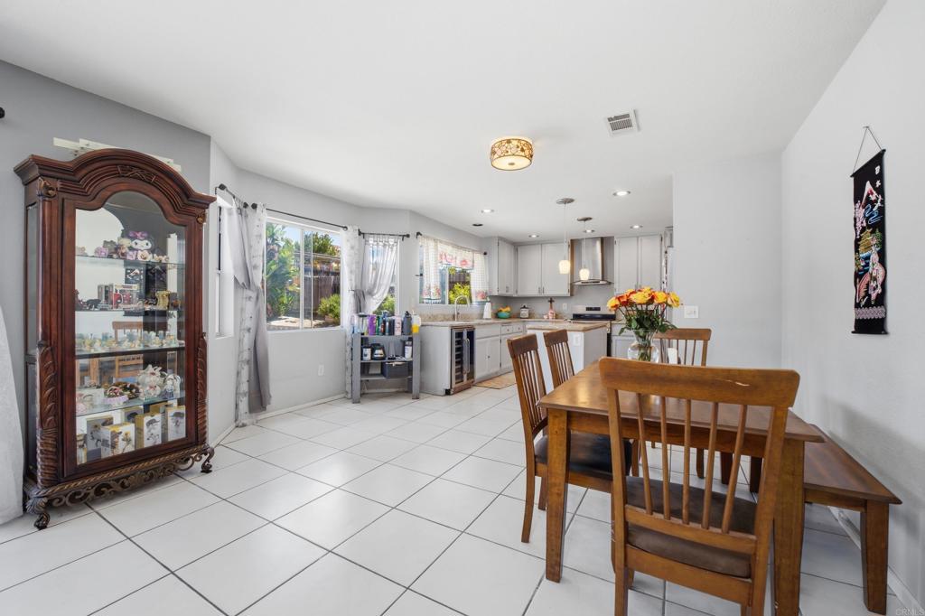 2077 Westwood Road Vista, CA 92083 - Photo 13 of 37 a view of a dining room with furniture