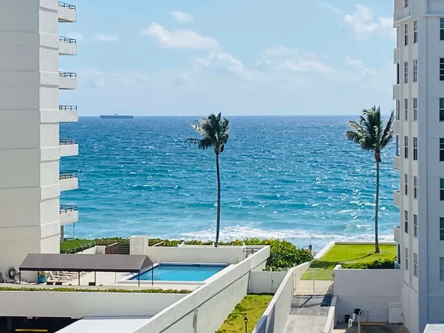 a view of a terrace with chairs