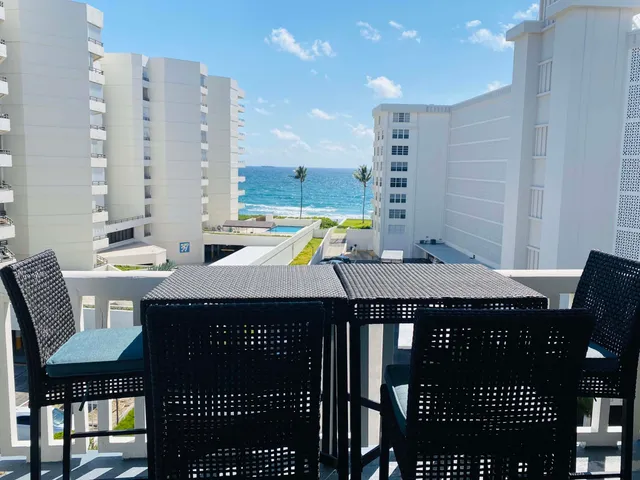 a view of a kitchen with furniture
