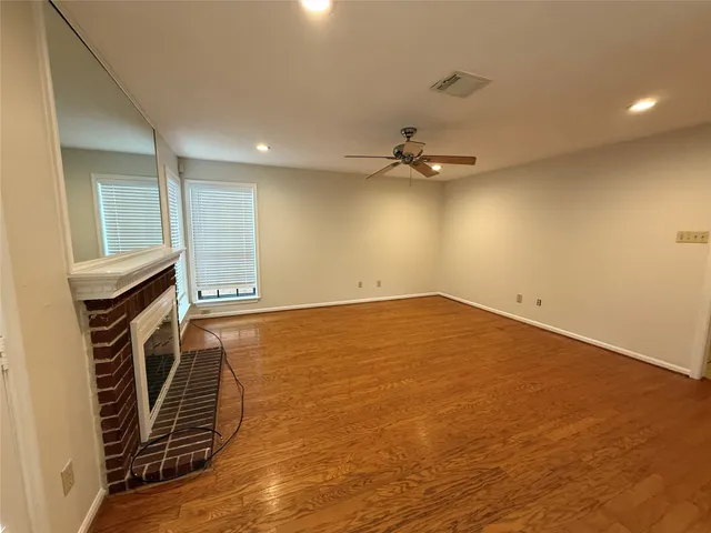a kitchen with a stove and a refrigerator
