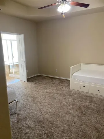 a view of a room with an empty space