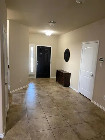 a view of a livingroom with a hallway