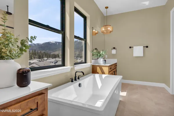a kitchen with stainless steel appliances a sink and cabinets