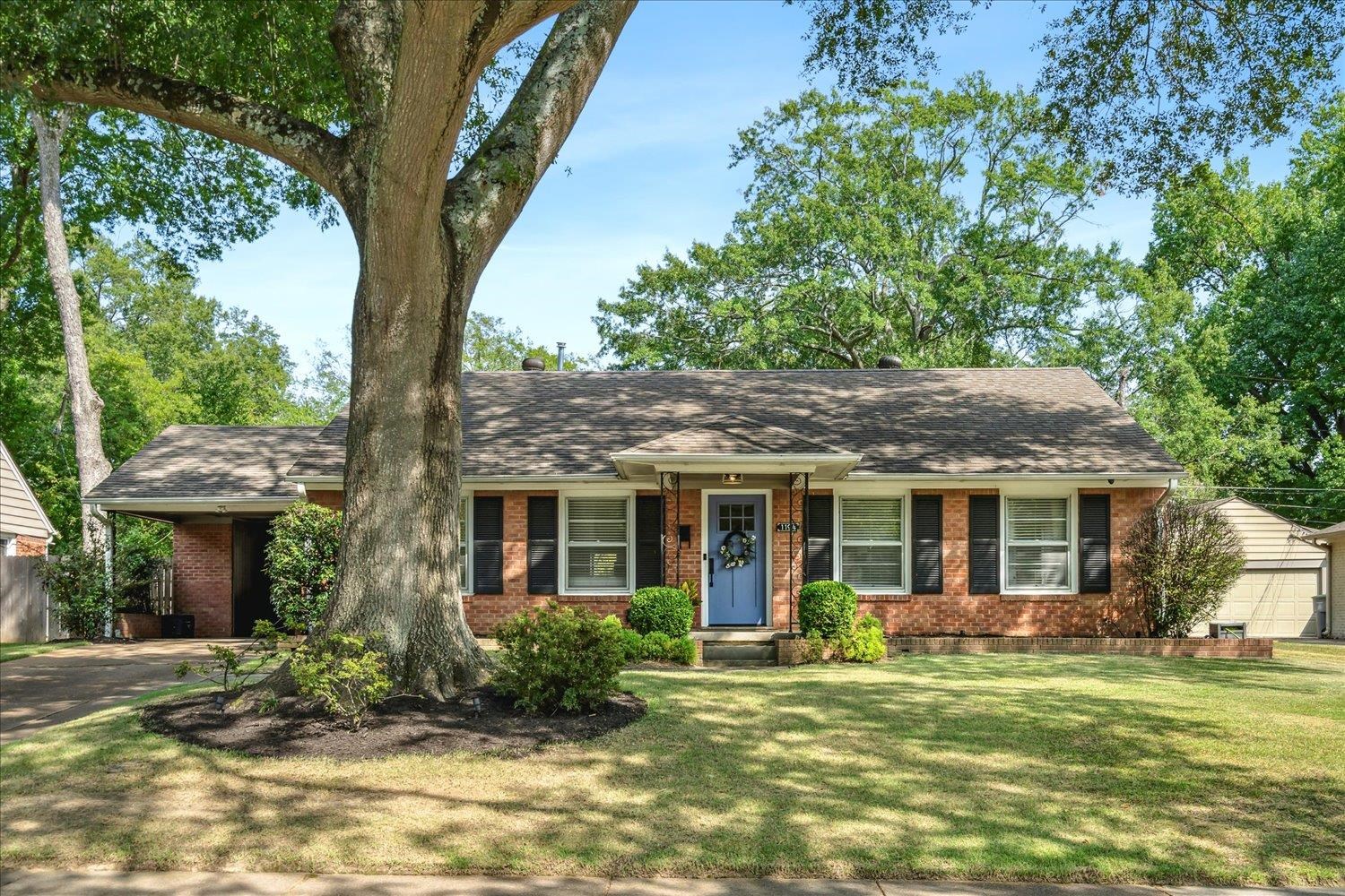 1104 West Perkins Road Memphis, TN 38117 - Photo 1 of 34 a front view of house with yard and green space