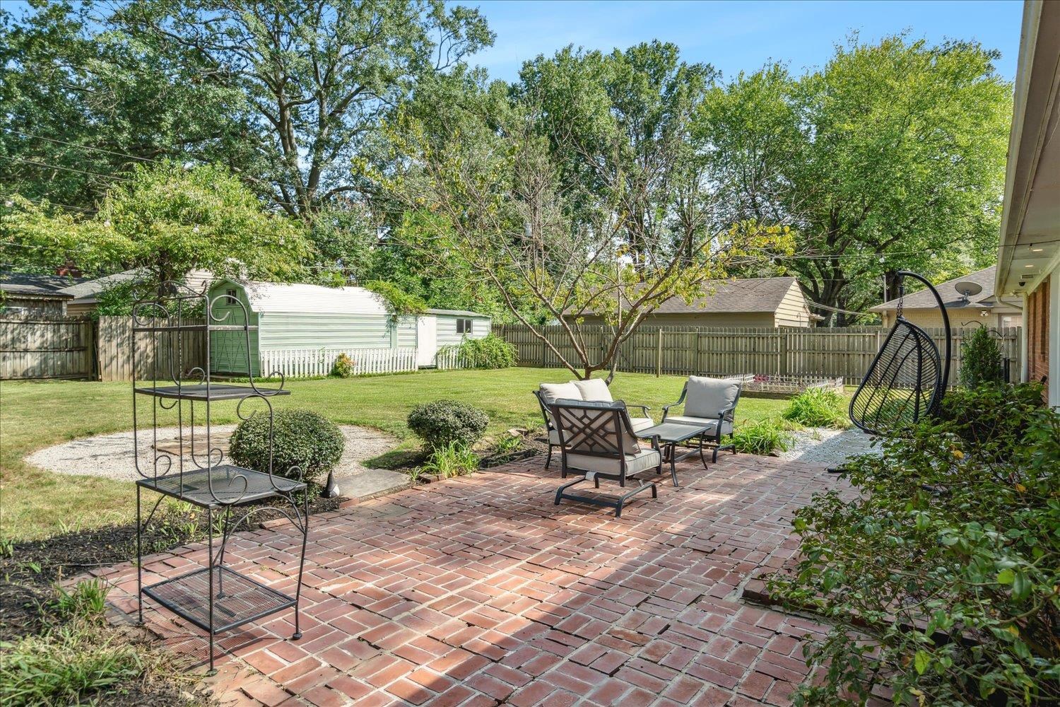 1104 West Perkins Road Memphis, TN 38117 - Photo 27 of 34 a view of a house with backyard and sitting area