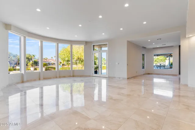 a kitchen with kitchen island granite countertop a sink and counter space