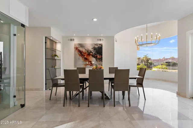 a spacious bedroom with a large bed and a couch