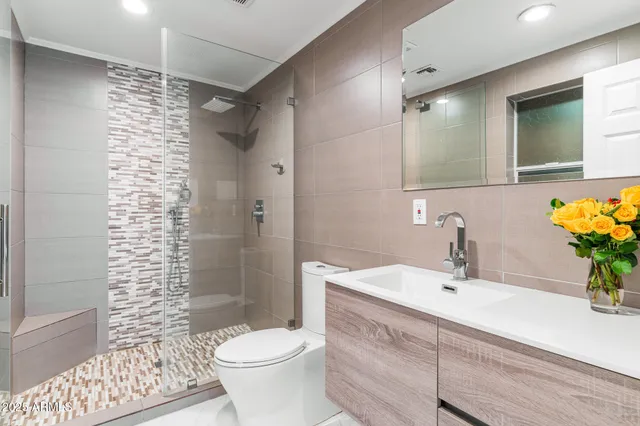a view of a room with wooden ceiling