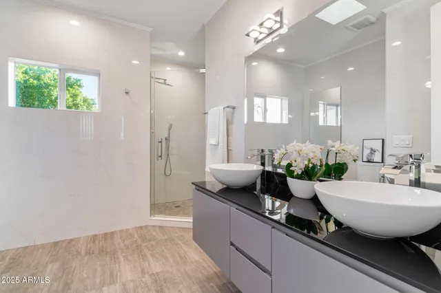 a view of a patio with dining table and chairs