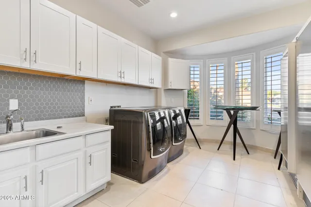 a bathroom with a toilet and shower