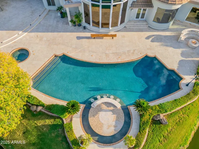 a view of a lake with houses in the back