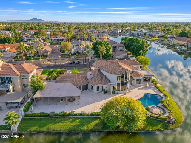 a view of a swimming pool with a lake view