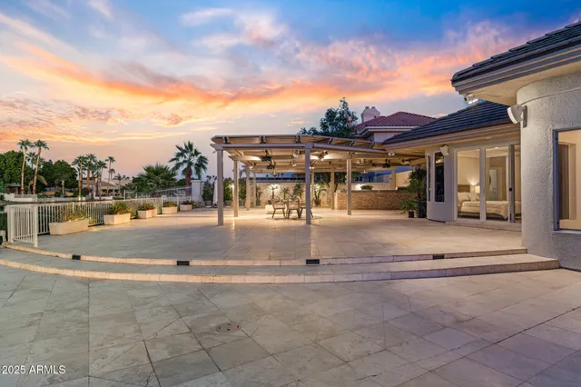 an aerial view of a house with a ocean view