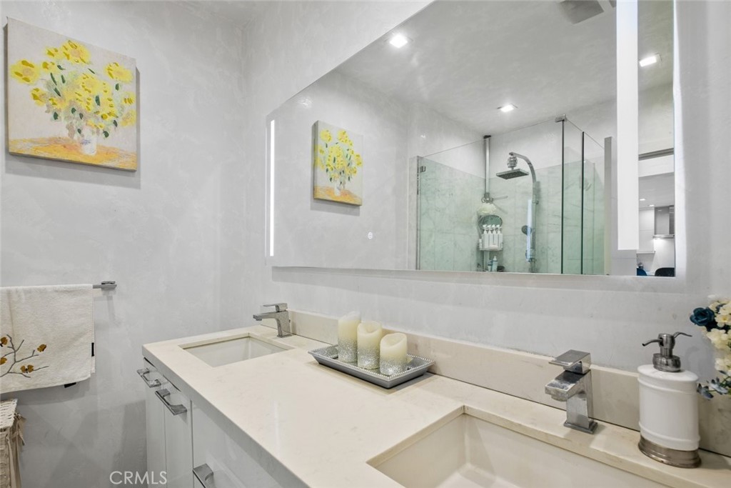 2640 North Keystone Street Burbank, CA 91504 - Photo 29 of 48 a bathroom with a sink and a mirror