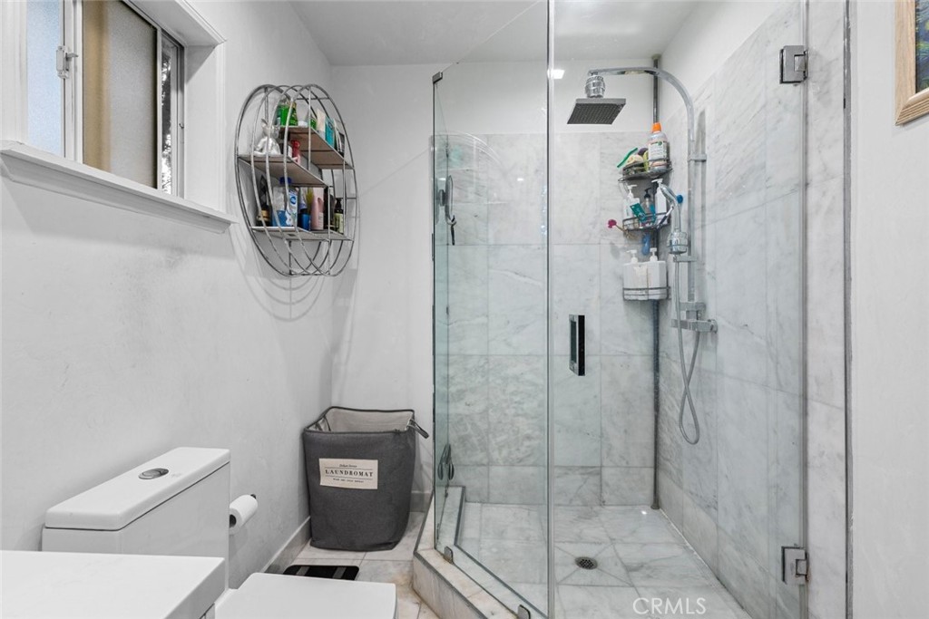 2640 North Keystone Street Burbank, CA 91504 - Photo 34 of 48 a bathroom with a shower and a toilet