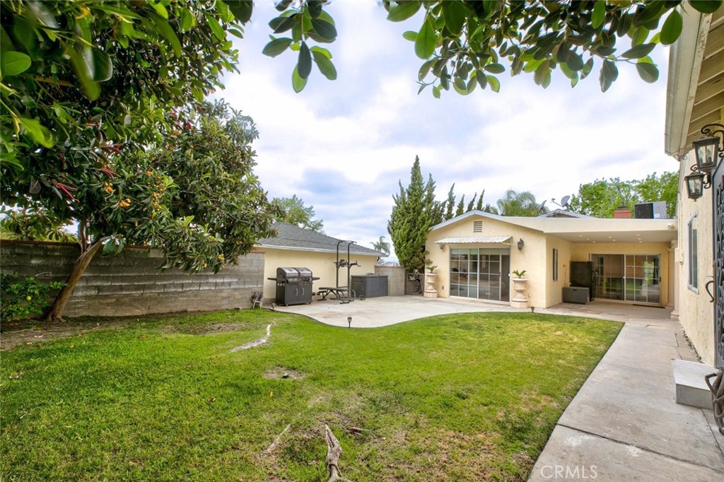 2640 North Keystone Street Burbank, CA 91504 - Photo 35 of 48 a view of a house with a big yard and large trees