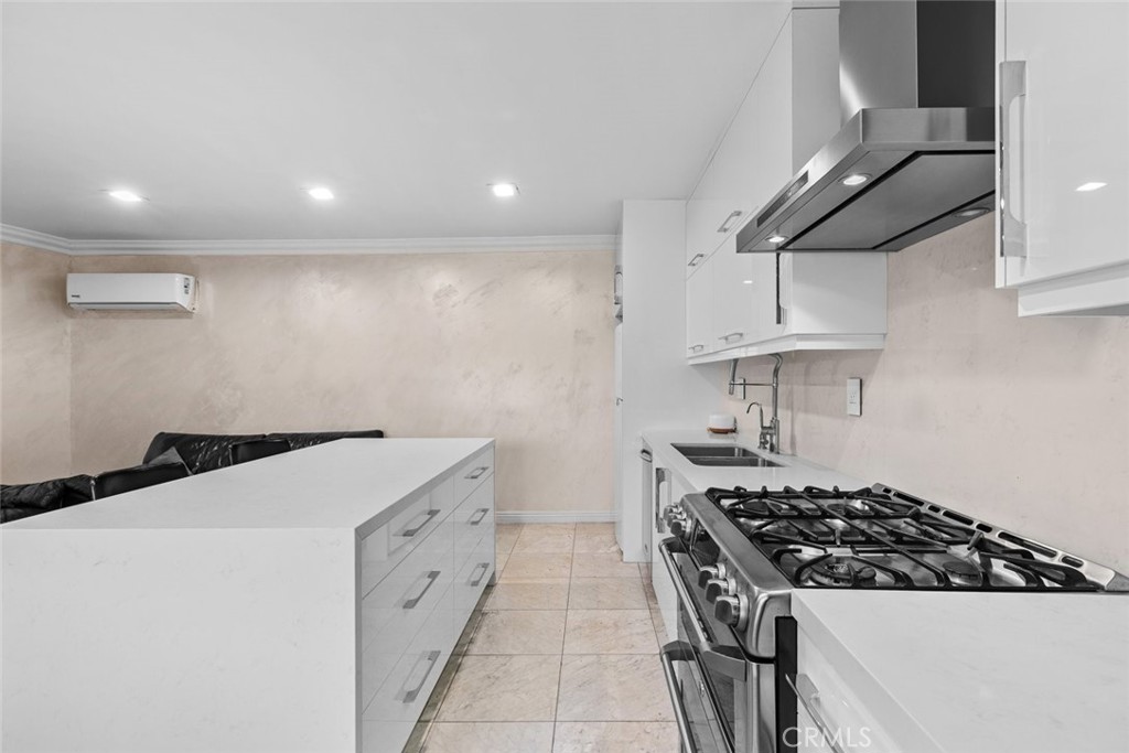 2640 North Keystone Street Burbank, CA 91504 - Photo 43 of 48 a kitchen with a stove and a sink