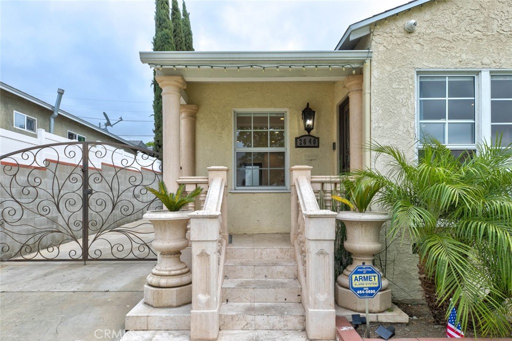 2640 North Keystone Street Burbank, CA 91504 - Photo 5 of 48 a view of a house with potted plants