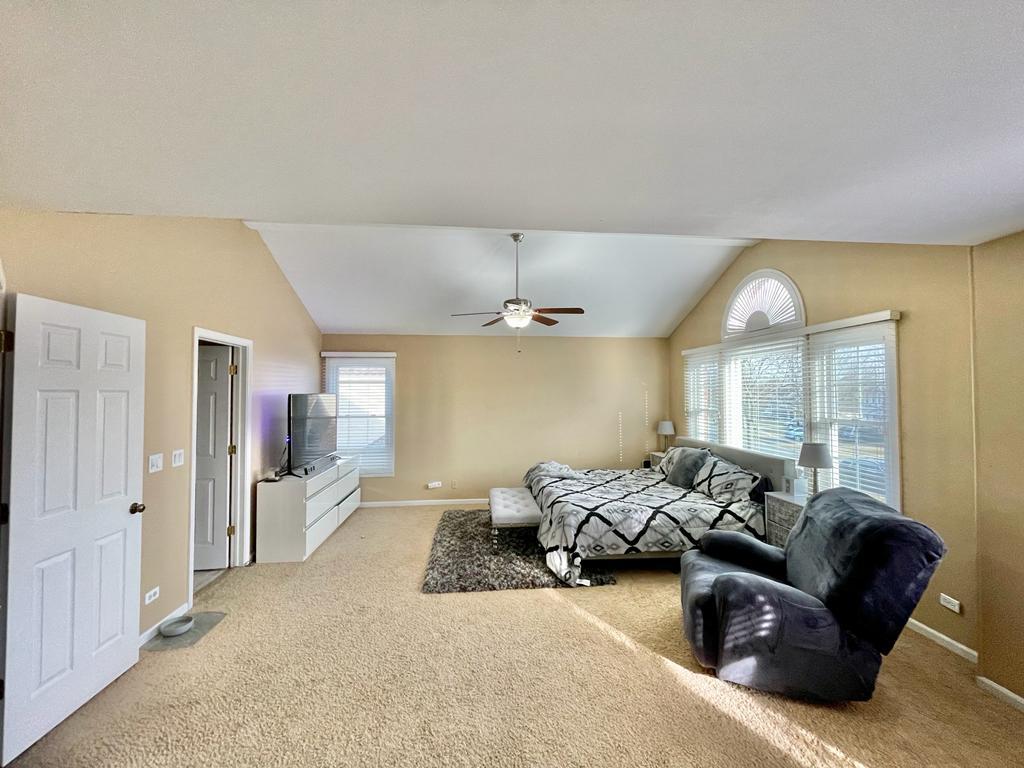 1236 Sagebrush Trail Cary, IL 60013 - Photo 10 of 17 a bedroom with furniture and a large window