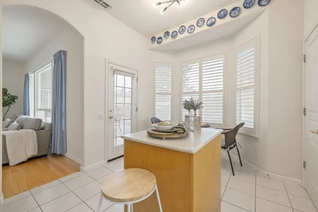 a view of a livingroom with furniture and window