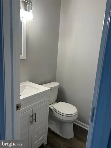 a bathroom with a toilet and a sink