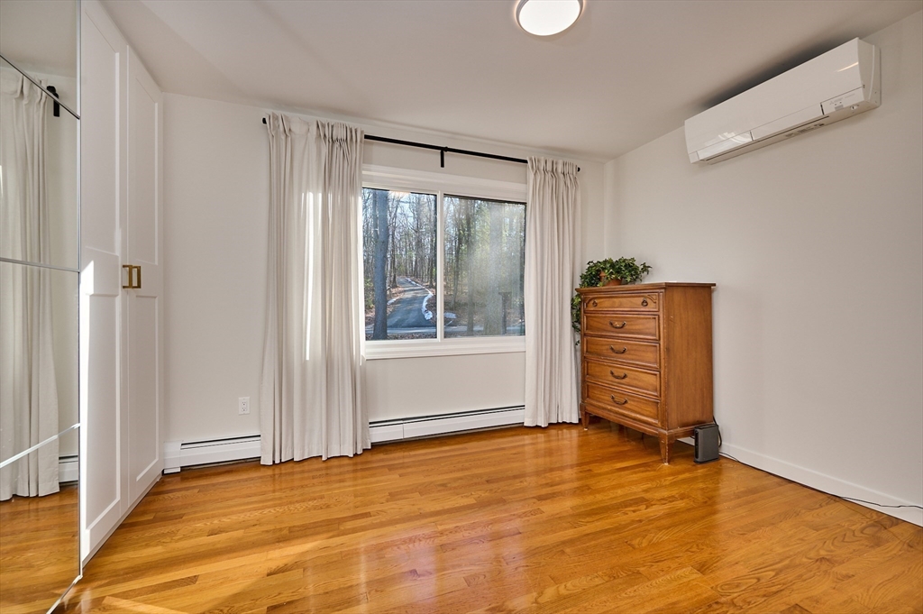 15 Gulf Road Pelham, MA 01002 - Photo 19 of 42 a view of an empty room with window and closet