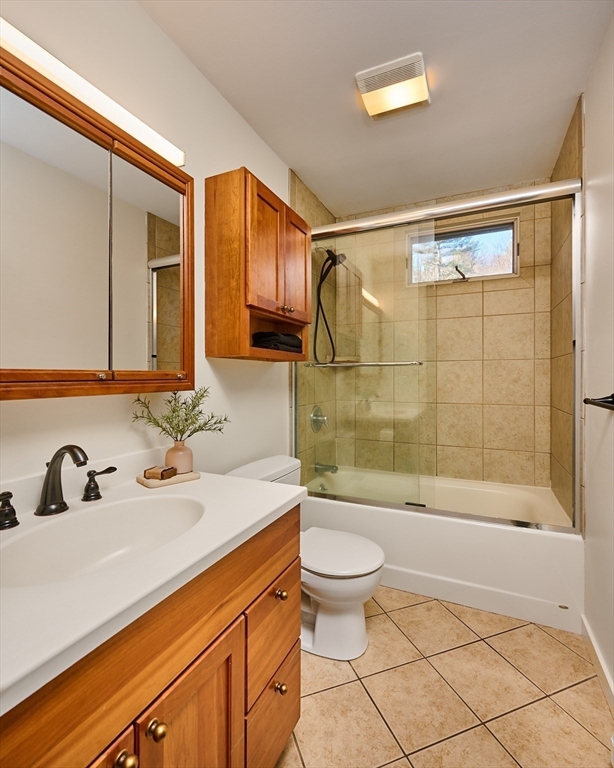 15 Gulf Road Pelham, MA 01002 - Photo 21 of 42 a bathroom with a sink a toilet and shower