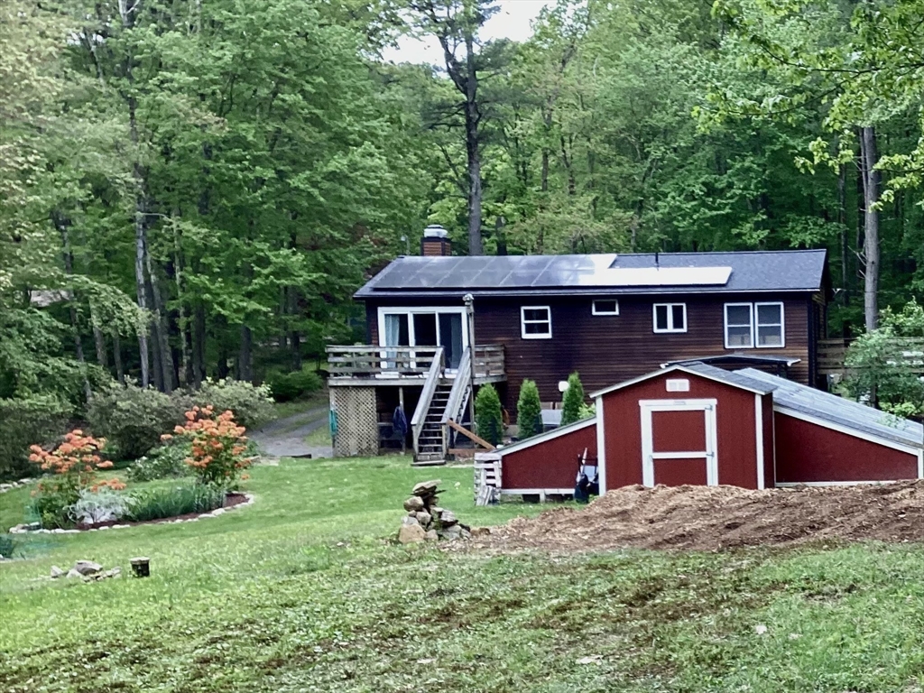 15 Gulf Road Pelham, MA 01002 - Photo 36 of 42 a front view of a house with garden