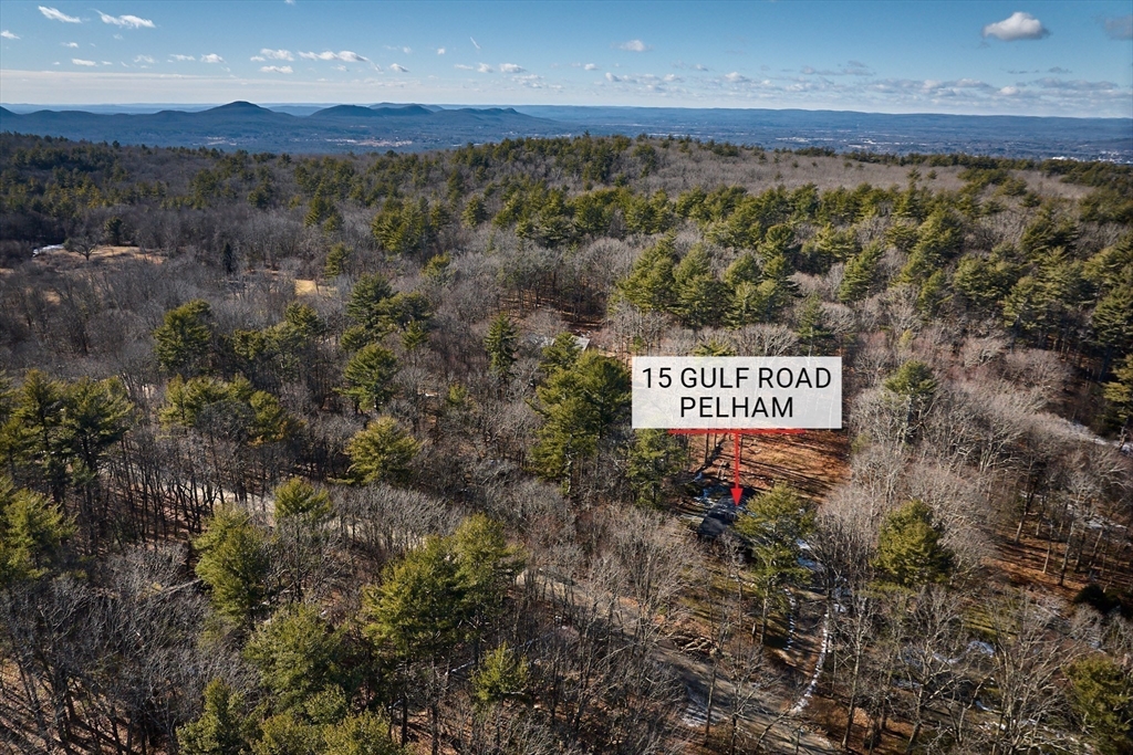 15 Gulf Road Pelham, MA 01002 - Photo 40 of 42 a sign that is sitting in front of a building