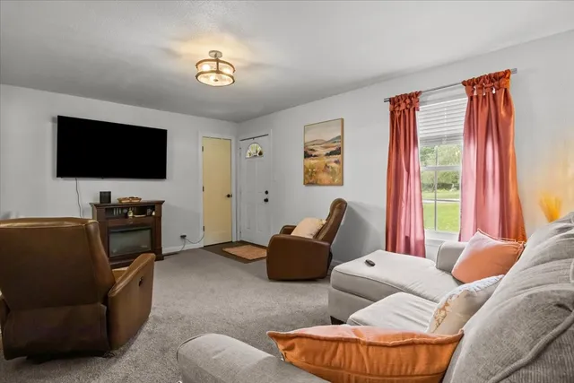 a bedroom with a bed and furniture