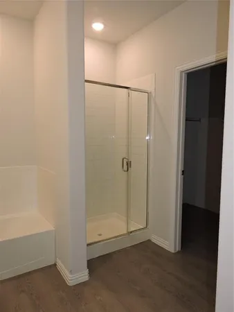 a bathroom with a sink double vanity and a mirror