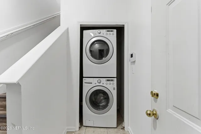 a utility room with dryer and washer