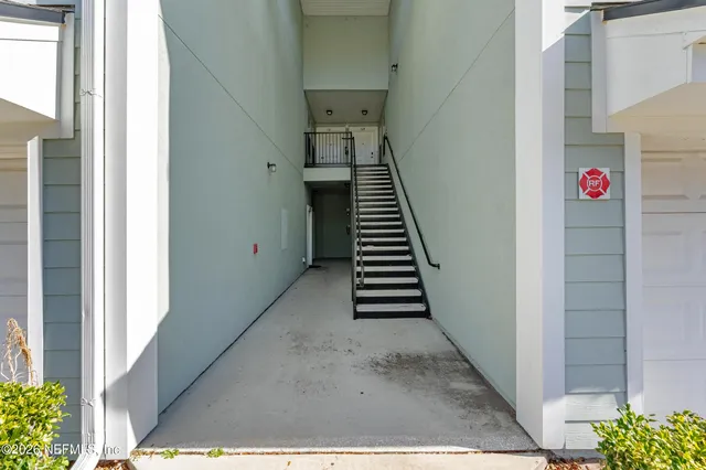 a view of an entryway with staircase