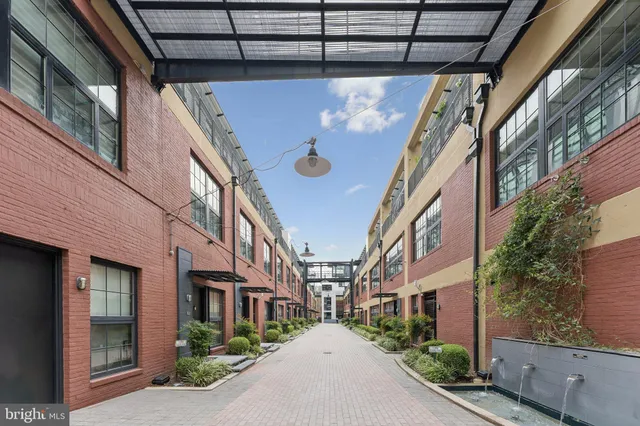 a view of a building with a street