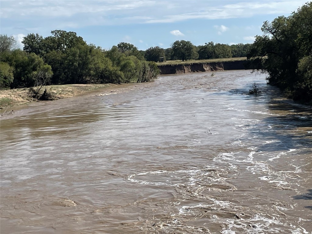 2371 County Road 2371 Road Meridian, TX 76665 - Photo 2 of 34 a view of a road with a yard
